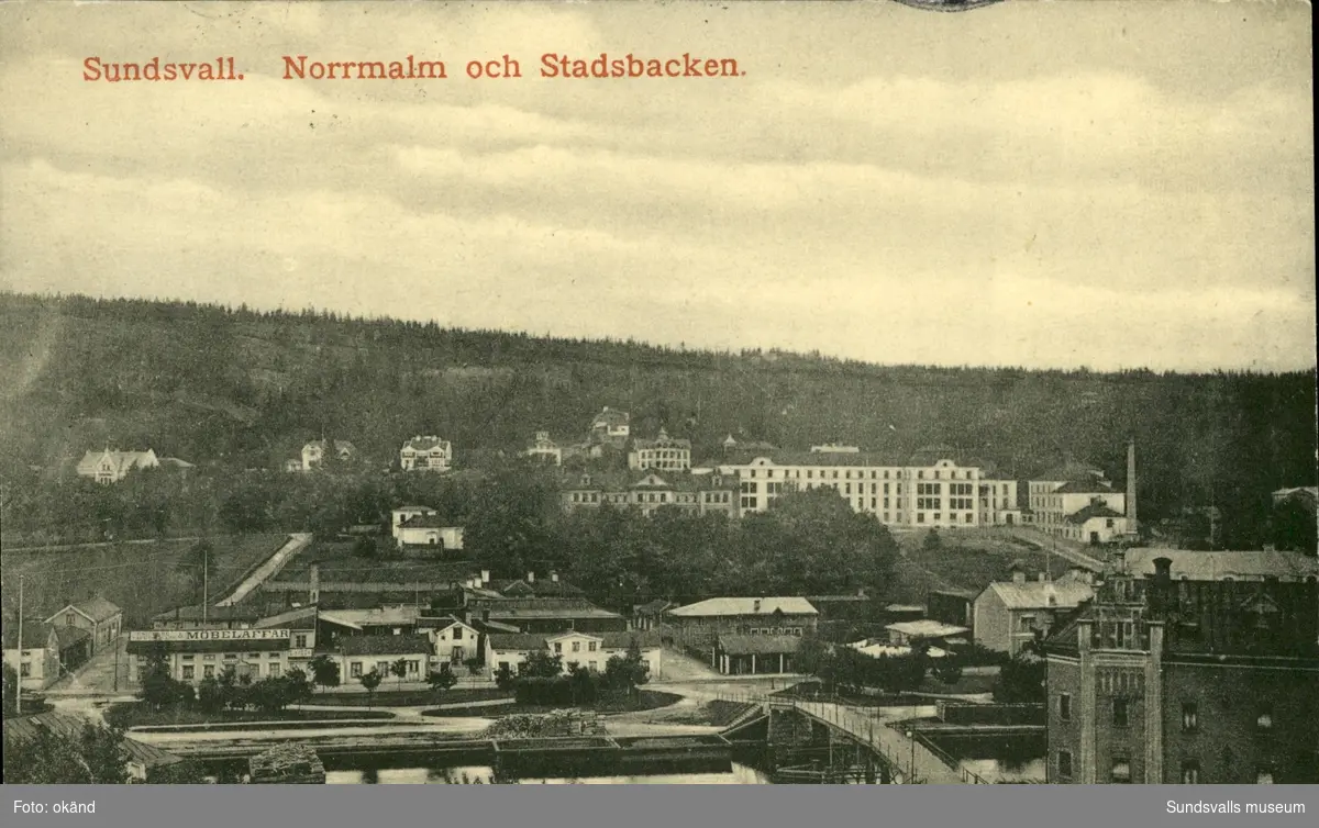 Vykort med motiv över Norrmalm och Stadsbacken i Sundsvall.