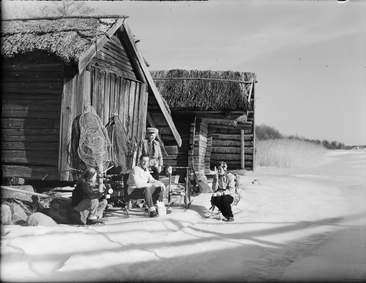 Vinterpicknick vid sjöbodarna vid Tuskötäppan, Uppland