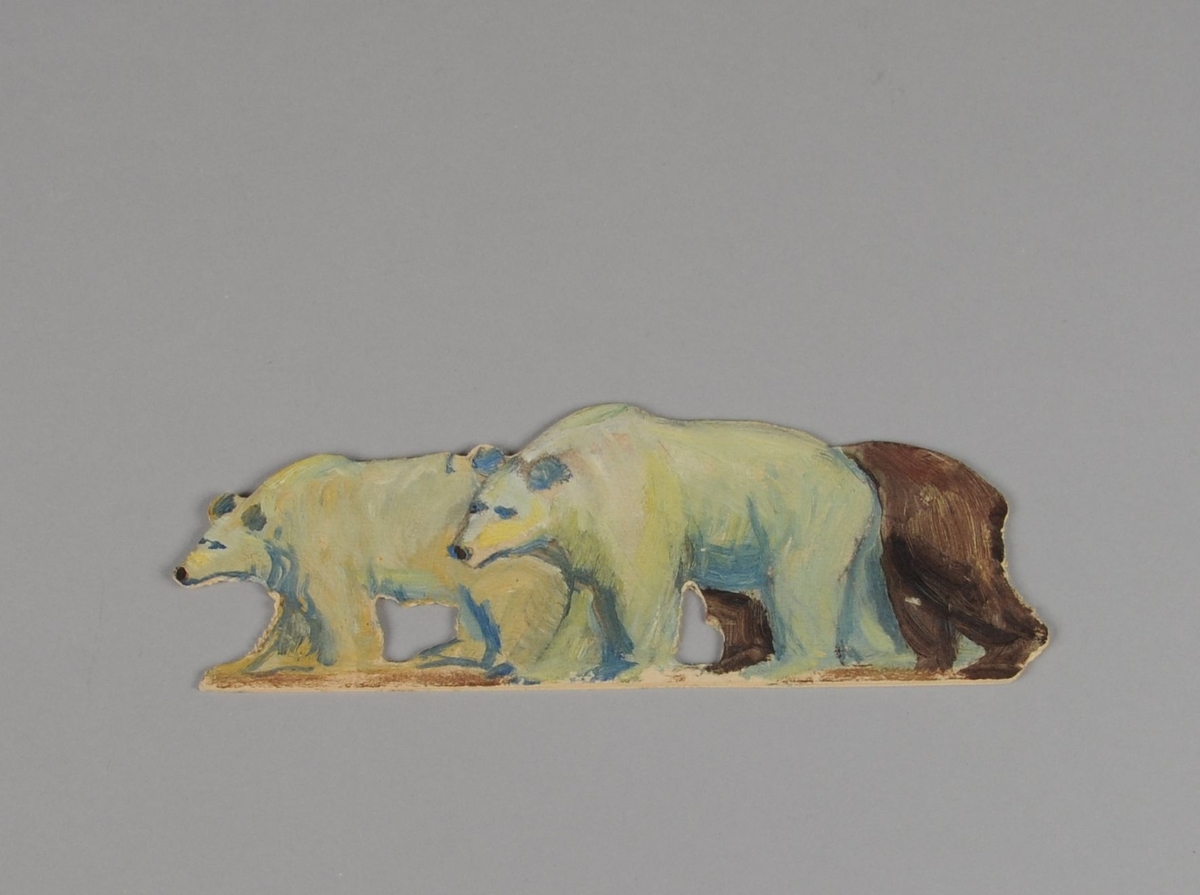 To figurer av papp. Figur 36a forestiller isbjørn, figuren er malt på begge sider. Figur 36b forestiller to isbjørner og en brunbjørn.