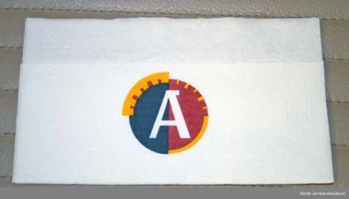Serviett merket med Agenda-logo