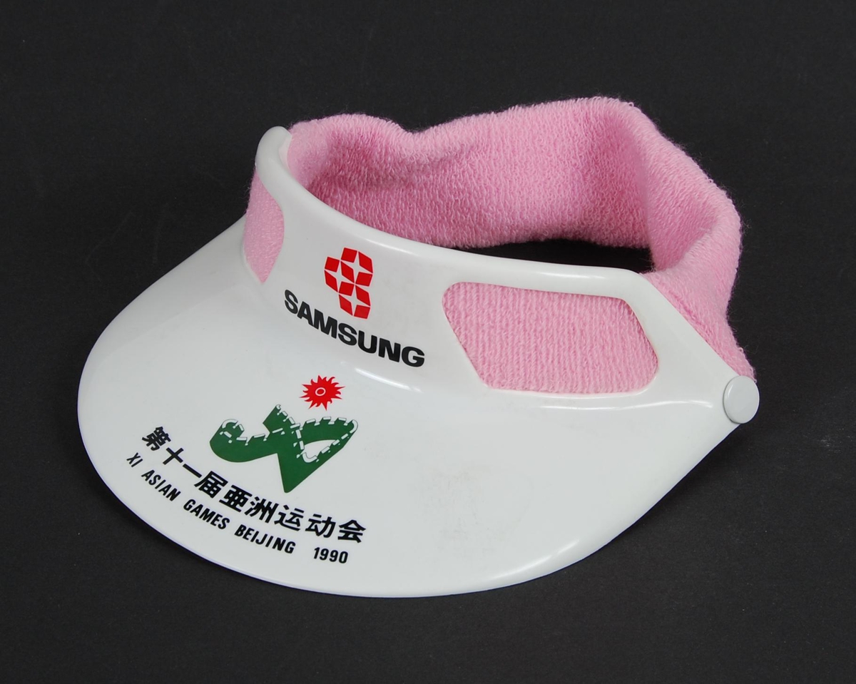 Hvit og rosa solskygge med logo for arrangementet Asian Games i Beijing i 1990 og Samsung.